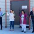 Mayor and Councillors officially open the Fire Training Centre with the uncoupling of a fire hose.