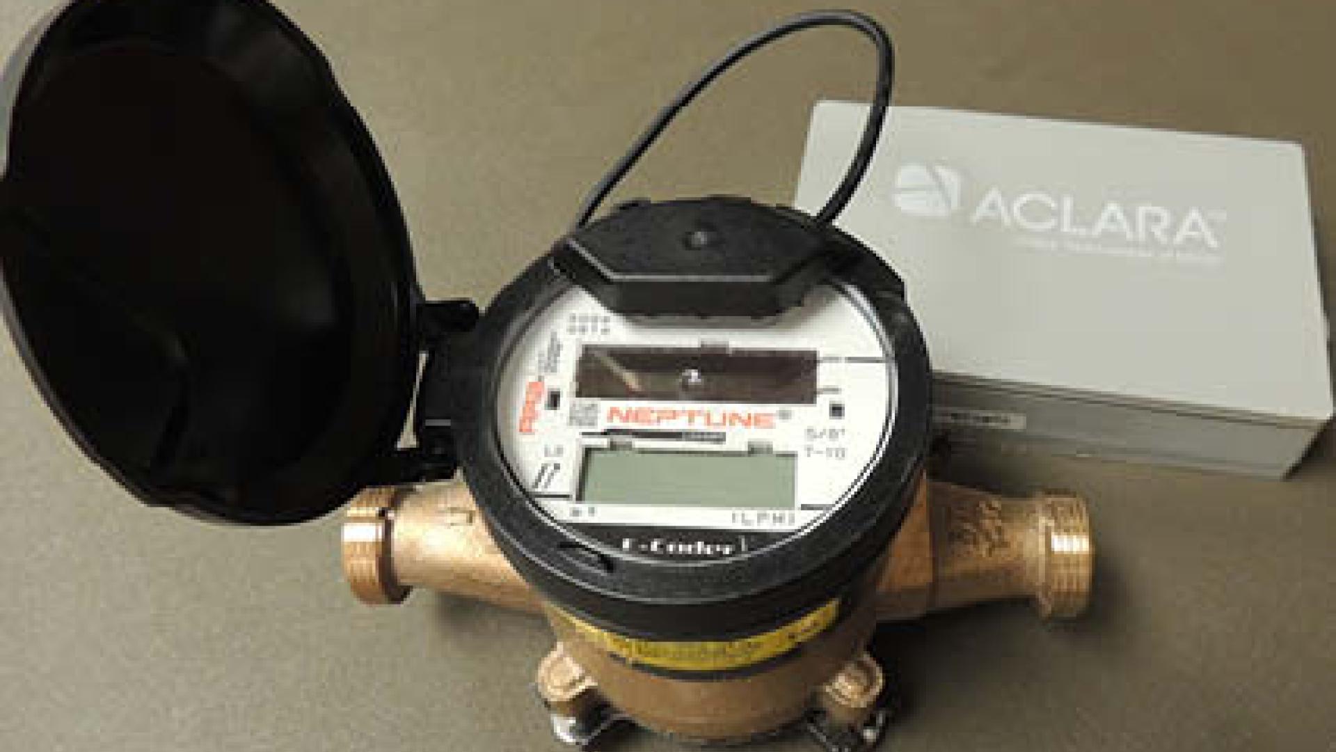 Water meter with electronic display on its top.