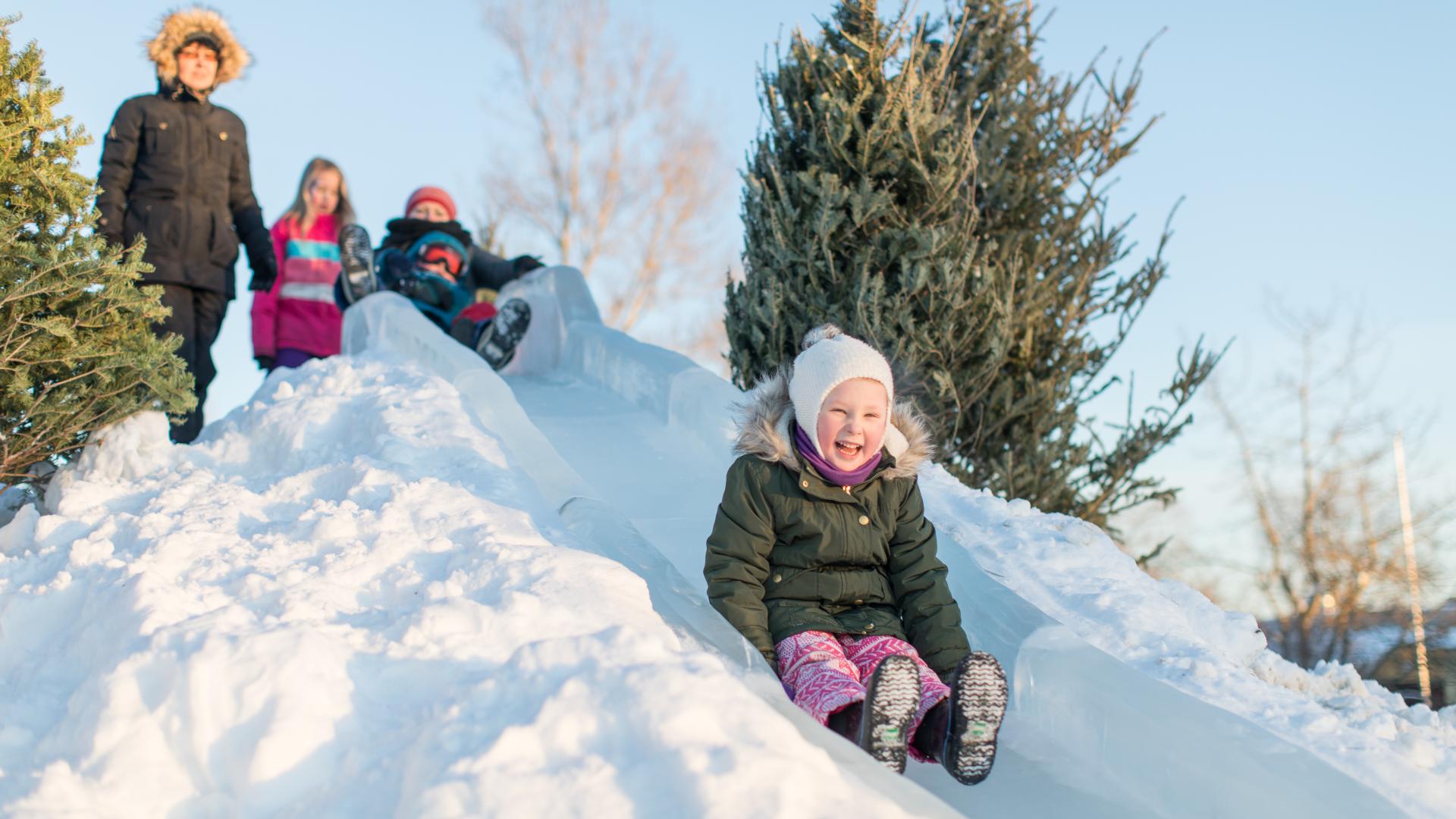 Kids enjoying ice slides
