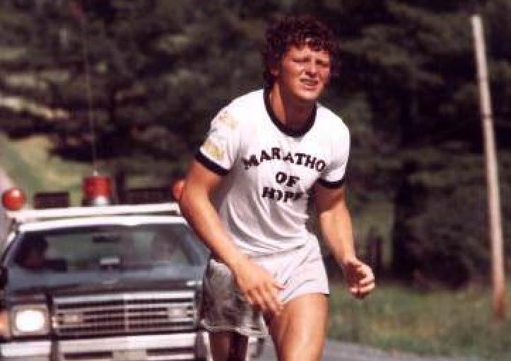 Terry Fox running with car in background. Marathon of hope on tshirt