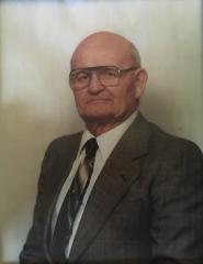 Pappy poses for a photo wearing a suit.